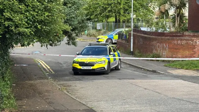 A police cordon at the scene of a stabbing outside apartments in the Kinnaird Avenue area of north Belfast.