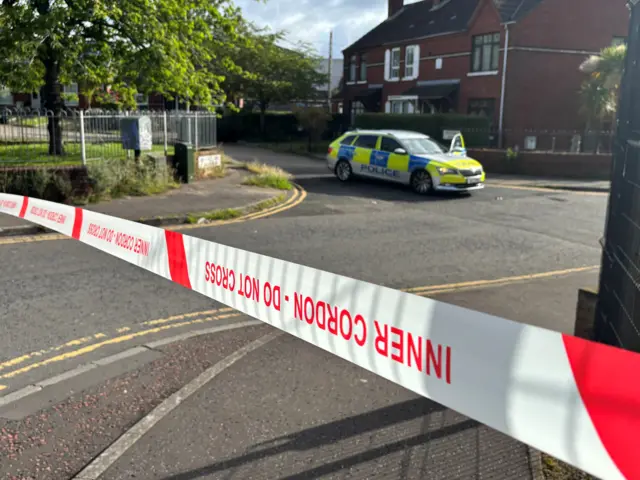 A police cordon at the scene of a stabbing outside apartments in the Kinnaird Avenue area of north Belfast.