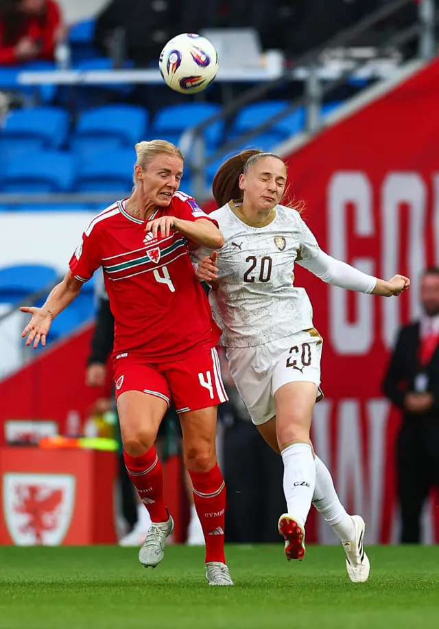 Sophie Ingle of Wales (left) is challenged by Sabina Strizova of Czech Republic