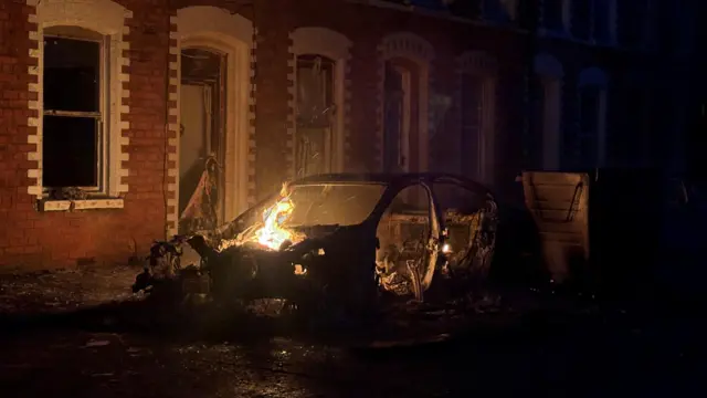 A car burns in east Belfast.