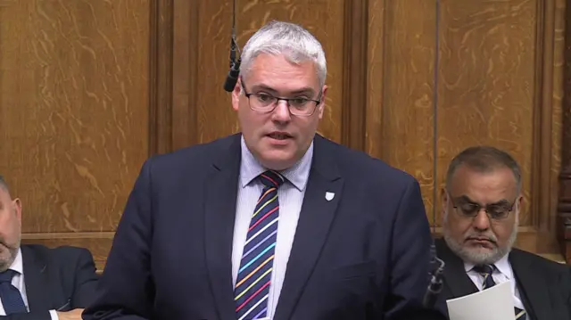 Gavin Robinson addresses the House of Commons from the back benches