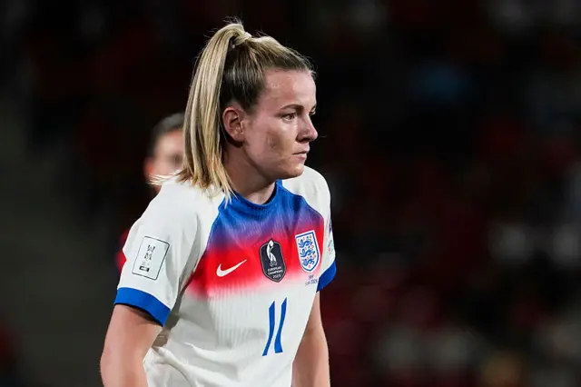Lauren Hemp in a white England home kit