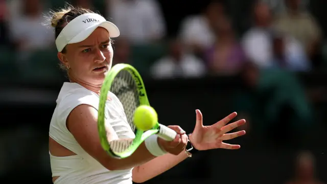 Barbora Krejcikova hits a forehand