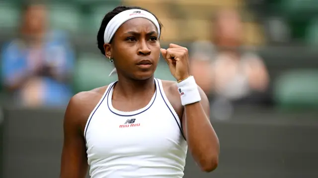 Coco Gauff celebrates with a clenched fist