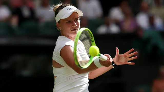 Barbora Krejcikova hits a forehand