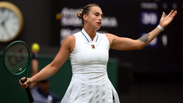 Aryna Sabalenka with arms outstretched