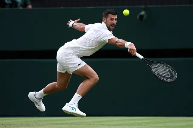 Novak Djokovic of Serbia plays a backhand