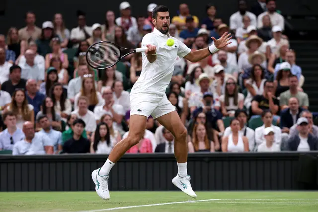 Novak Djokovic of Serbia plays a forehand