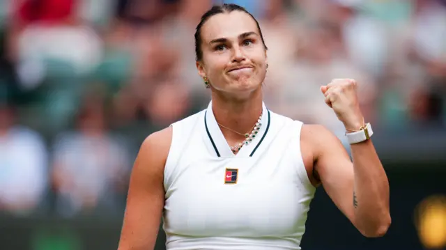 Aryna Sabalenka clenches her fist in celebration