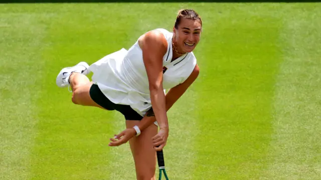 Aryna Sabalenka serves