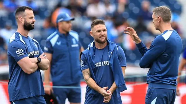 England team in discussion