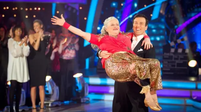 Anton du Beke lifting up Ann Widdicombe during Strictly Come Dancing