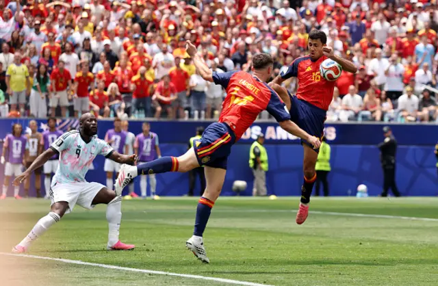 Aymeric Laporte #14 of Spain heads the ball towards Rodri