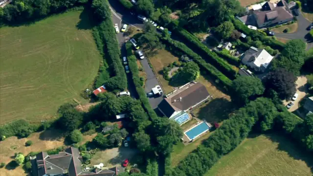 An aerial shot of Anne Widdecombe's rural home. It is surrounded by multiple large green spaces
