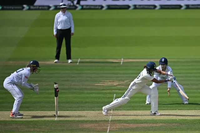 Harmanpeet Kaur is bowled by Mady Villiers