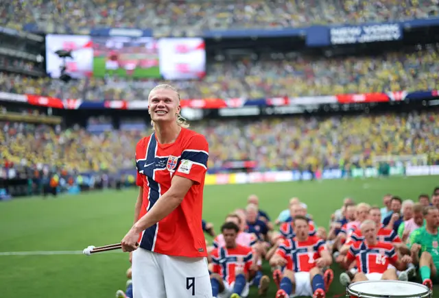 Erling Haaland leads Norway players and fans in Viking rowing chant