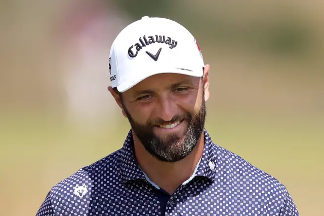 Jon Rahm smiles