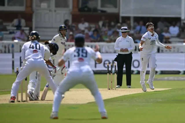 Issy Wong reacts while bowling for England against India at Lord's