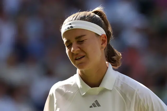 Karolina Muchova looks frustrated