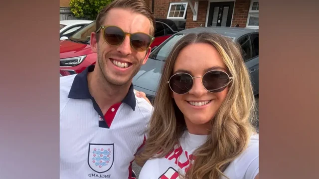 Georgia Hallgalley and Jake Hawker wearing England shirts