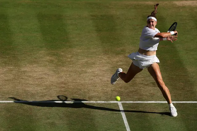Karolina Muchova hits a forehand