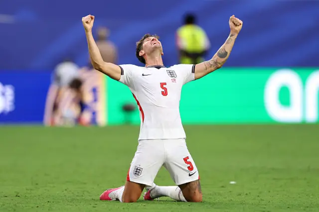 John Stones #5 of England celebrates