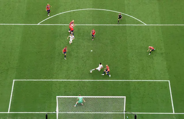 Jude Bellingham #10 of England scores his team's second goal