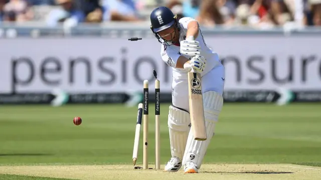 Alice Capsey stumps scattered by the ball