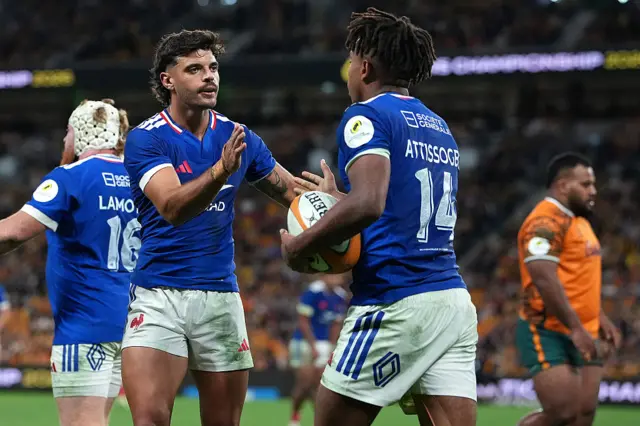 Theo Attissogbe celebrates with Romain Ntamack