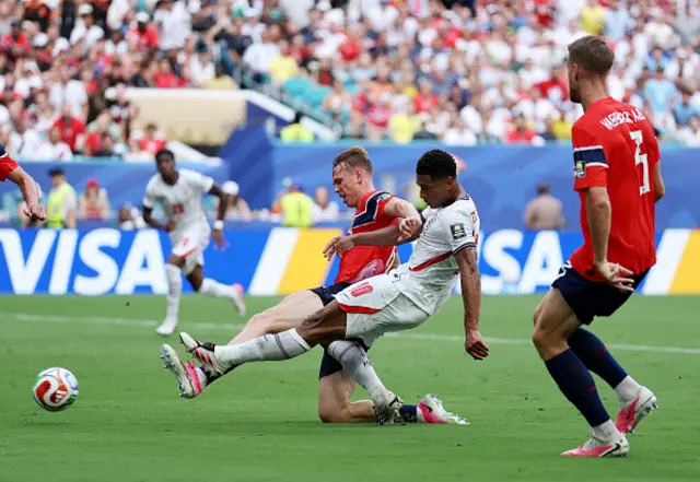 Jude Bellingham #10 of England scores his team's first goal