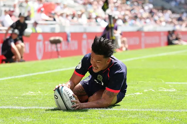 Marcus Smith touches the ball down