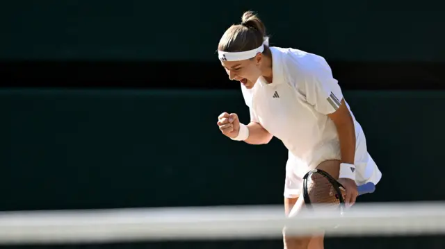 Karolina Muchova celebrates