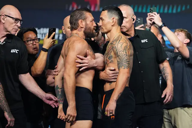 Conor McGregor facing off with Max Holloway