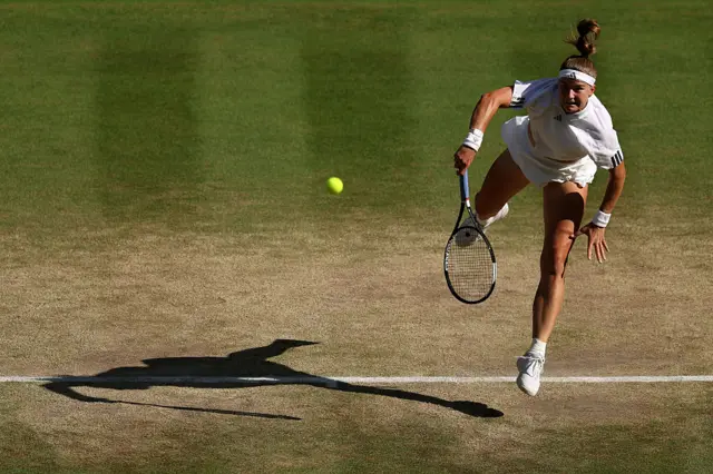 Karolina Muchova serves
