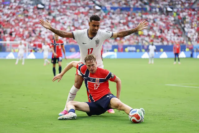 Torbjorn Heggem #17 of Norway competes for the ball against Morgan Rogers