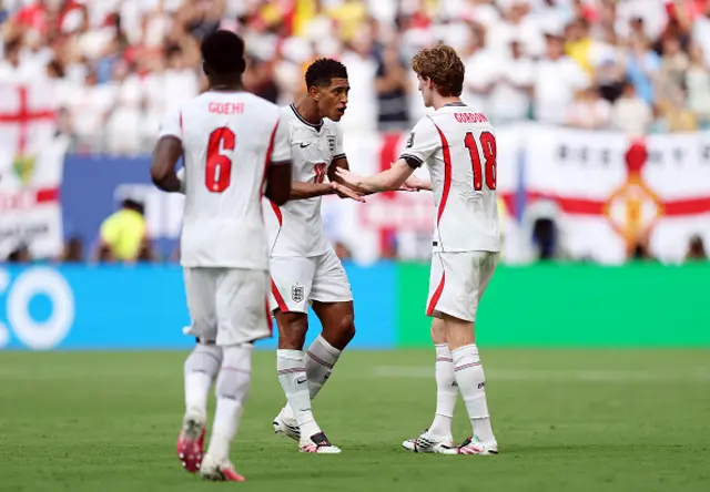 Jude Bellingham #10 of England celebrates with Anthony Gordon
