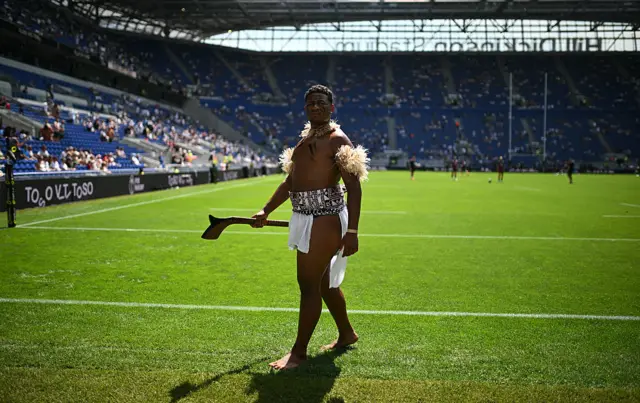 Traditional Fijian dancer on the pitch