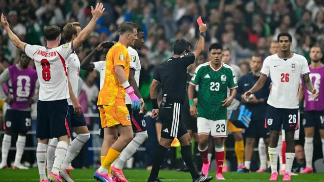 Jarell Quansah is shown a red card in the second half of England's last-16 World Cup tie against Mexico