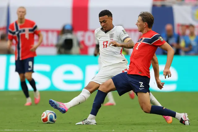 Morgan Rogers of England and Sander Berge