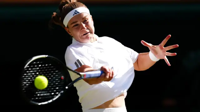 Karolina Muchova hits a forehand