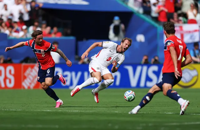 Harry Kane #9 of England reacts after challenged by Patrick Berg