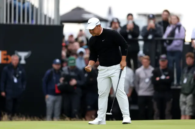Tom Kim celebrates
