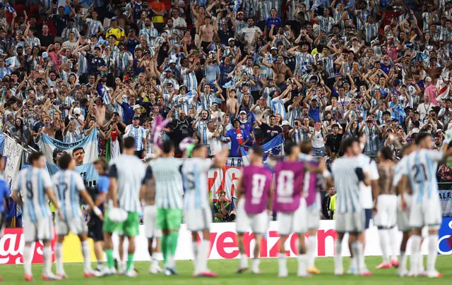 Argentina players applaud fans