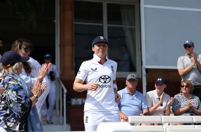 Heather Knight runs out of the Lord's pavillion