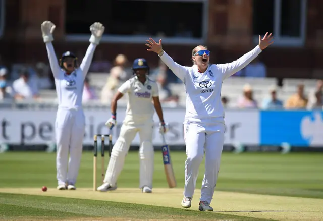 Sophie Ecclestone celebrating