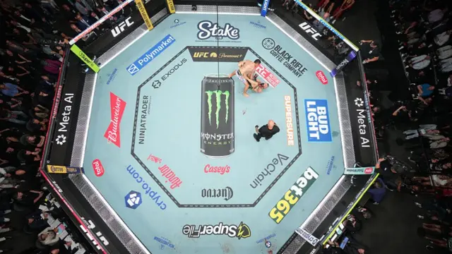 Max Holloway and Connor McGregor in the ring