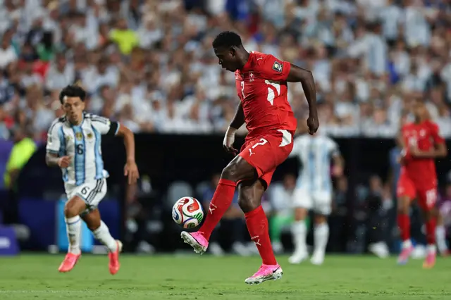 Breel Embolo controls the ball