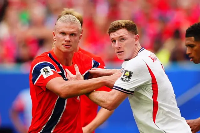 Erling Haaland (L) of Norway and Anderson (R) of England in action