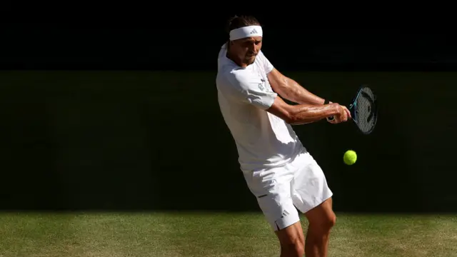 Alexander Zverev hits a backhand