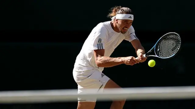 Alexander Zverev hits a backhand